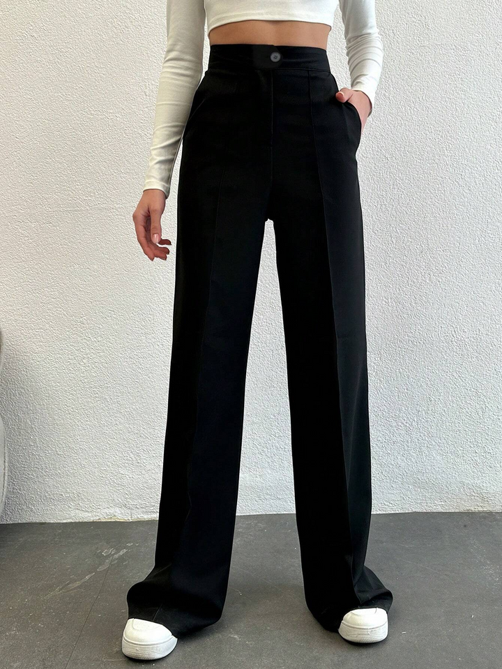 Pantalon élégant à taille haute et jambes droites