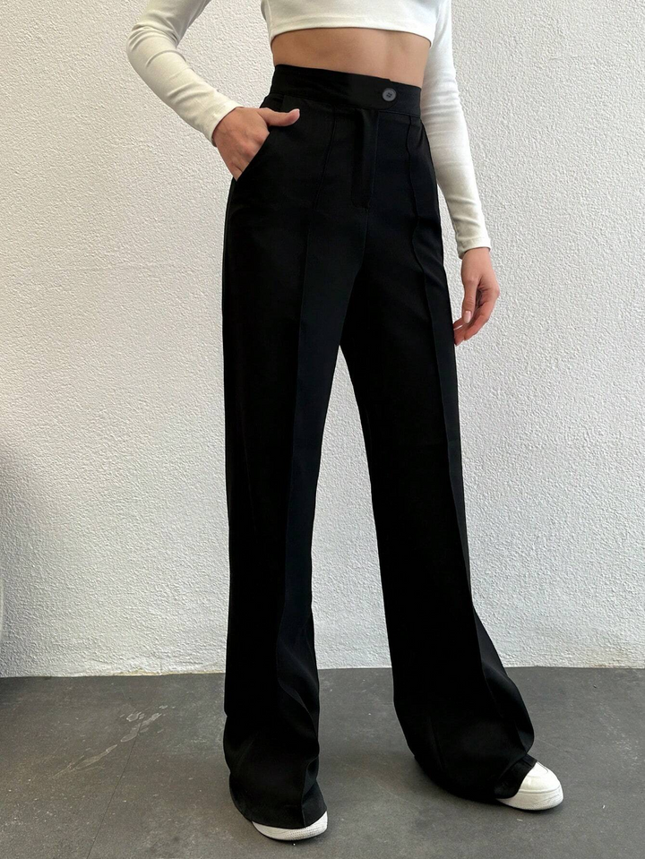 Pantalon élégant à taille haute et jambes droites